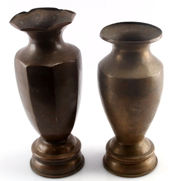 LOT OF 2 WWII 105MM M14 SHELL TRENCH ART SPITOONS: Two WWII trench art spitoons. Both made from a 105mm M14 shell casing, as marked to bottom. Some bends to rim and normal wear. One stands 13 inches and the other 11.75 inches.