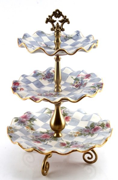 MACKENZIE CHILDS MORNING GLORY 3-TIER SWEETS TRAY: One Mackenzie Childs Morning Glory Three Tier Sweets tray. Item is made of clay, and brass. Item is discontinued. Item is 16" tall, and the trays measure 7-1/2", 9-1/2", and 11-1/2". All trays are in 
