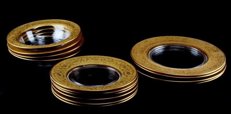 GOLD RIMMED GLASS BOWLS, SALAD & DINNER PLATES: Lot of glass tableware with 22kt gold rim. 8 soup bowls, 10 salad plates, and 14 dinner plates. All dishes are in good condition, with minimal wear. All are completely intact with no chips or cracks.