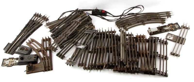 2 BOXES FULL OF O GAUGE TOY TRAIN TRACK OVER 100: We did not count but certainly over 100 pieces.