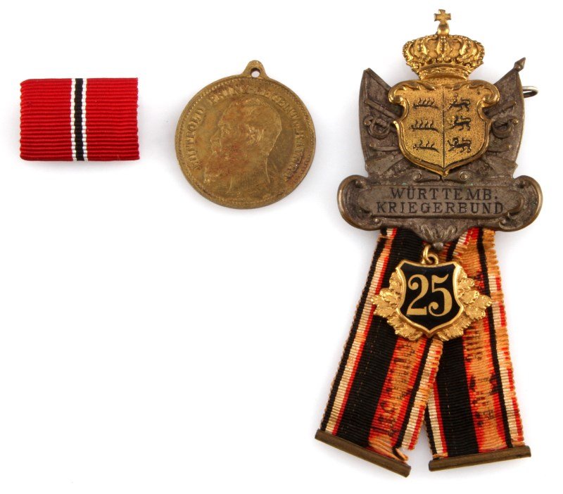 WWI IMPERIAL GERMAN WAR VETERANS 25 YEAR MEDAL: Well crafted, the lettering on the ribbons has faded. Designed for Great War veterans. Also a Leopold 1896 Hanover medal. And a WWII eastern Front ribbon.