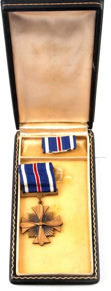 WWII AMERICAN DISTINGUISHED FLYING CROSS W/ CASE: A World War II era Distinguished Flying Cross in period black coffin case. In near excellent condition.