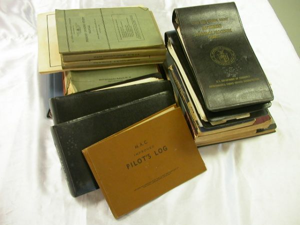 WWII AVIATION BOOKS FLIGHT MANUALS LOT BOOK: WWII AVIATION BOOKS FLIGHT MANUALS LOT BOOK LOT OF WWII AVIATION INSTRUCTION MANUAL, ORIGINAL ARMY AIR CORP LOG BOOK, SECTIONALS, JONES AIRCRAFT MANUAL, POLARGUIDE, NAVY AVIATION BOATS MANUAL AND MORE