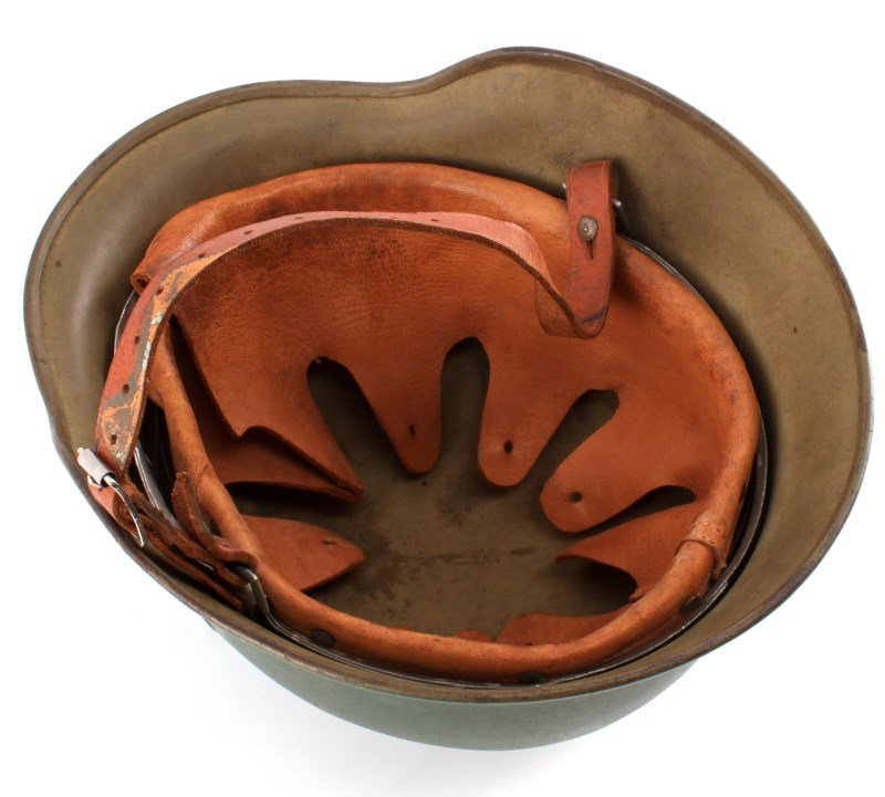 REPAINTED THIRD REICH M40 NAZI STEEL COMBAT HELMET: One M40 German Helmet. Item is an original WWII Nazi German Third Reich M40 helmet, but item has been repainted, had new decals put on, and a new leather liner. Item appears to be in good condition wi