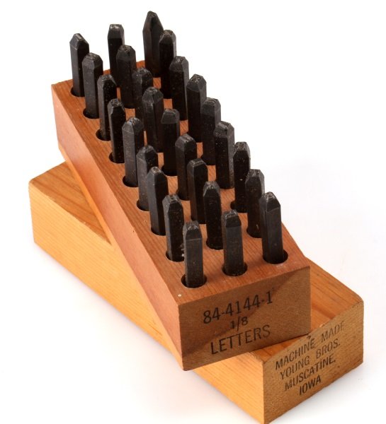 MACHINE MADE YOUNG BROS. 27 LETTER EMBOSSING KIT: Machine Made Young Brothers. 27 letter embossing kit , wooden box is marked "Machine Made Young. Bros Muscatine, Iowa 84-4144-1 1/8 letters" . Item is in very good overall condition with no signs of d