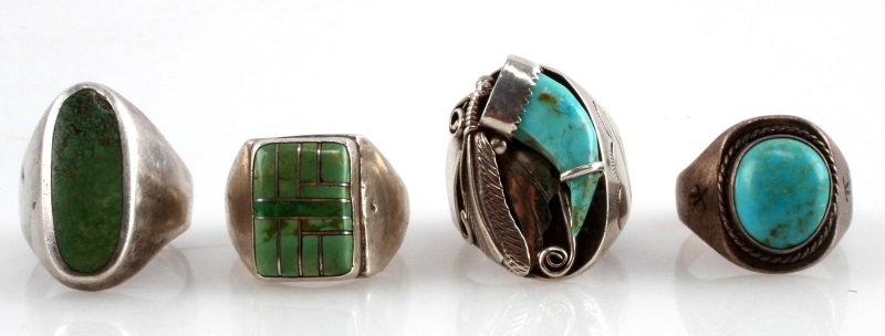 4 PIECE LOT NATIVE AMERICAN STERLING SILVER RINGS: All rings are in good condition but do show signs of age. Combined weight of 64g. 1st ring is size 12. It has a oval turquoise stone that is 2cm by 2 cm. 2nd is a size 12. It has a rectangle shape tur