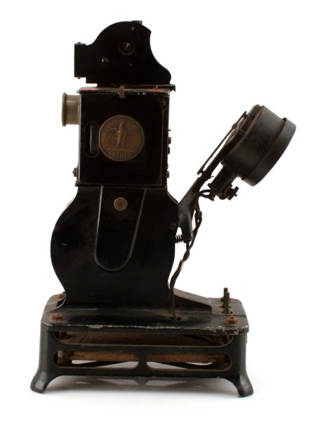 PATHEX PATHE 9.5 MM FILM PROJECTOR CIRCA 1920'S: Vintage circa 1920's movie projector made in France by Pathe, also known as Pathex. Some of the original cloth covered wiring remains. Untested. The hand crank's tip is missing, but otherwise appears