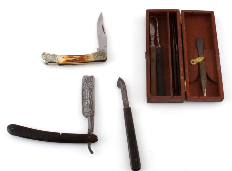 LOT OF ANTIQUE COLLECTIBLE KNIVES AND BLADES: Lot includes one Masonic straight razor, a folding pocketknife, a wood carving eraser knife, and an antique surgeons kit. All are in good condition.