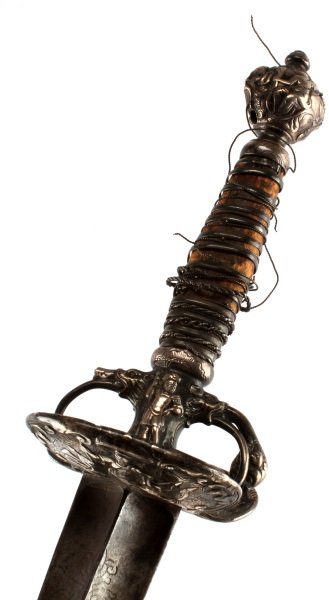 18TH CENT. STERLING HANDLE DECORATED FRENCH RAPIER: The decorated crossguard finger hold, rear qullion and pommel are all sterling, a multitude if imagery from centurion to demon heads, very bust, , without handle, wire grip is frayed, blade is good wi