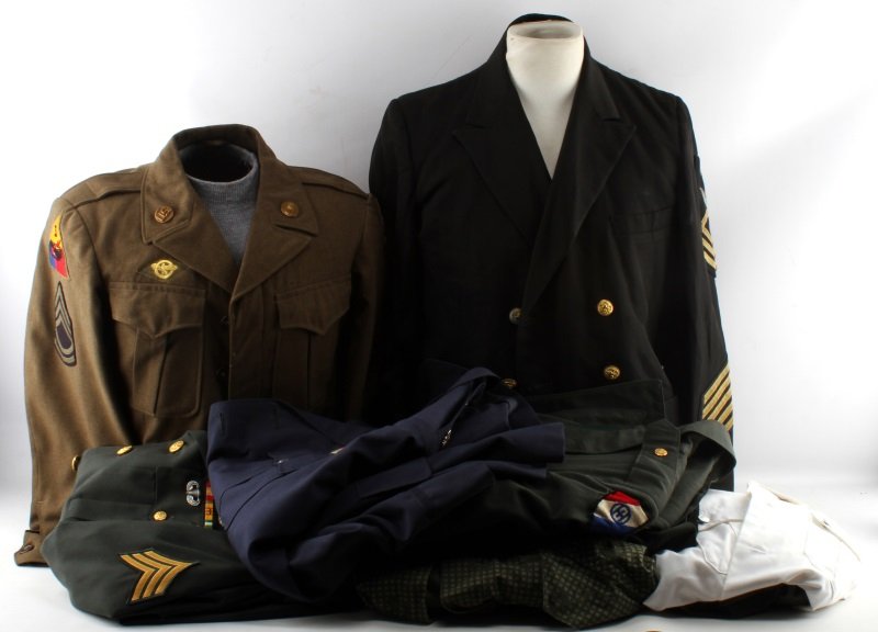 WWII VIETNAM TO DESERT STORM UNIFORM LOT: Includes small size Night Camo parka and trousers, size 39 Vietnam dress uniform with Combat Medic, Airborne, and Helicopter Assault with ribbons and SGT. chevrons, air transport command uniform, a hi