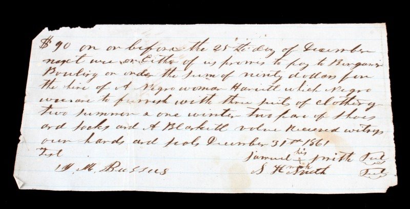 1860S SOUTHERN PLANTATION SLAVE PURCHASE DEED: In over all good condition. The top right corner has a small rip but the writing is not affected. It tell of a purchase of a female and clothing for $90. It is signed and dated Dec. 31st 1861.