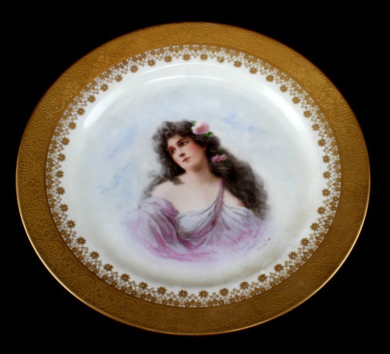 ANTIQUE LIMOGE PORCELAIN HANDPAINTED PLATE MARKED: Antique J.Pouyat Limoges porcelain hand painted plate of lady in pink evening gown, with gold signature trim around plate. back of plate has mark of J.Pouyat Limoges, J.P, L. France. Plate in excellen