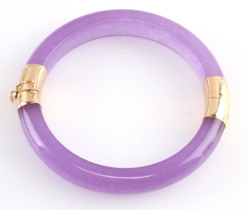 14K YELLOW GOLD LAVENDER JADE HINGED BRACELET: 14K Yellow Gold Lavender Jade Hinged Bangle Bracelet. It features a 14K yellow Gold side and clasp featuring a Chinese bamboo with safety chain secures the piece. Size 8 (65mm) inner, 13mm wide, 11mm 