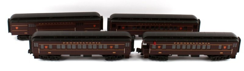 PENNSYLVANIA MTH ELECTRIC O SCALE TRAIN LOT OF 4: Four like-new MTH Electric O scale trains. Numbers 3466, 5753, 6905, and 4363. Measures 13 inches long. Very good condition.