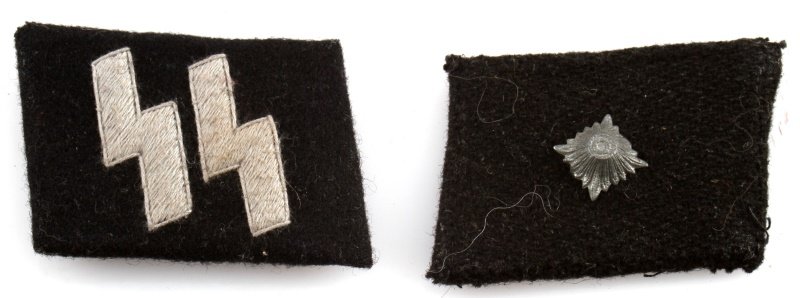 GERMAN WWII SS UNTERSCHARFUHER COLLAR TABS: Third Reich Germany WWII SS collar tabs, Unterscharfuher rank. Type 3 design. The Sig rune tab has become undone, but overall very good condition; free from mothing.