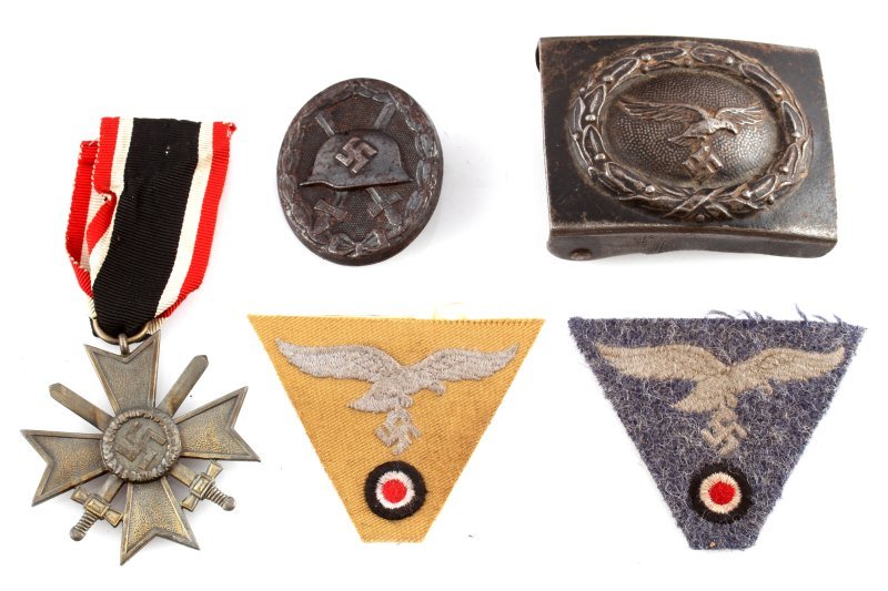 WWII GERMAN LUFTWAFFE BUCKLE HAT PATCH MEDAL & MOR: This lot includes Belt buckle no maker mark, wound badge black with straight pin, 1939 service medal and two side cap patches, all non fluorescing.