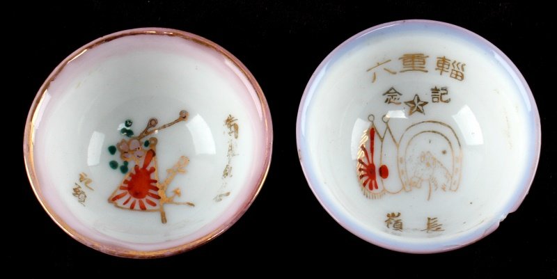 WWII JAPANESE SAKE CUP LOT OF TWO: Cavalry and Machine Gunner, Cavalry has a rim chip.
