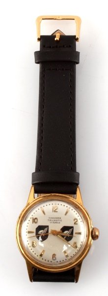 WWII THIRD REICH GERMAN WAFFEN SS 38TH DIV. WATCH: Waffen SS 38th division wirstwatch. Made by Junghans, Trilastic model with 17 jewel movement. German made. In very good condition with new strap.