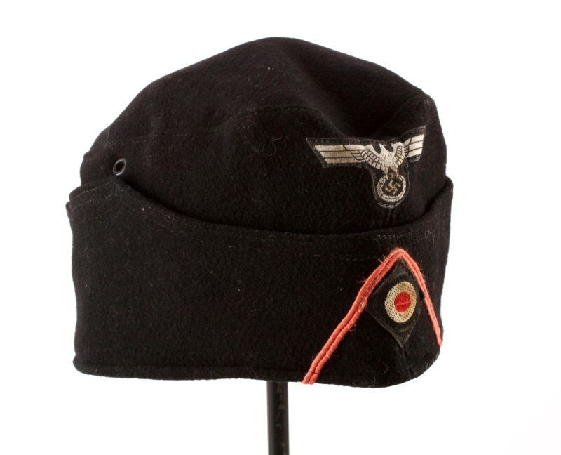 WWII THIRD REICH GERMAN PANZER GARRISON CAP: Black wool panzer garrison cap with cockade and eagle. No apparent maker's marks. About size 56. In very good condition. Unauthenticated, sold as is.