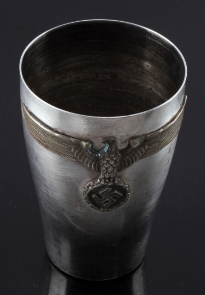 WWII GERMAN NSDAP REICHSADLER PRESENTATION CUP: WWII German NSDAP Reichsadler party presentation cup, measures 4 inches tall. Item is in good condition, unauthenticated sold as is. This lot has a reserve.