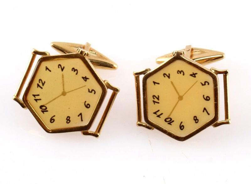 18K BRIONI WATCH CUFFLINK W/ STERLING SILVER CASE.: A pair of Brioni wirstwatch enamel cufflinks in 18 karat gold with original sterling silver and velvet case. In very good condition with light signs of use.