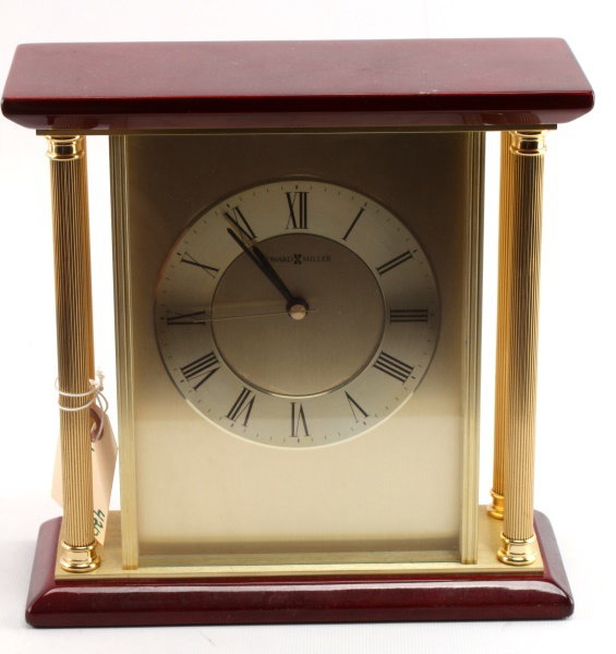 HOWARD MILLER TABLE DESK OR MANTAL CLOCK: Clock measures 8 1/2" tall by 9" wide. Good working condition.