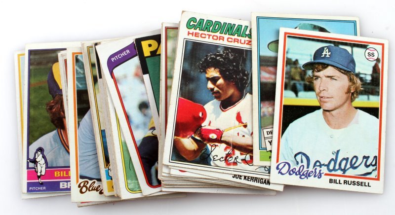 50 CARD LOT ASSORTED PRO MLB TRADING CARDS: All are in good condition. Some of the included but not limited to Burt Hooton,Jeff Leonard, Wilbur Wood, Warren Cromartie, Joe Kerrigan, Hector Cruz, Doc Ellis and Bill Russell and many more.