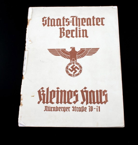 GERMAN THIRD REICH THEATRE PROGRAM BERLIN: This illustrated program contains information about play, pictures of cast members and interesting period advertisement. Program has some soiling, spine is not holding all the pages, otherwise in good