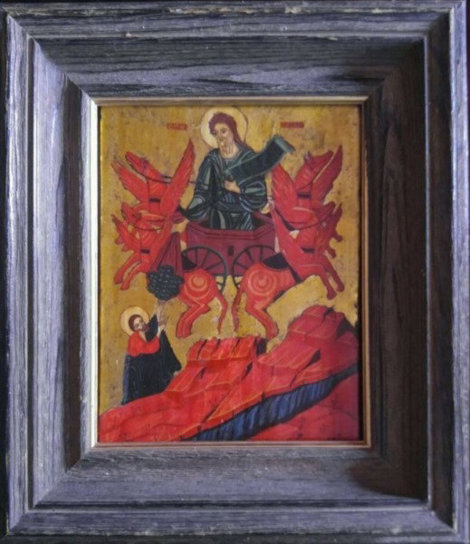 ANTIQUE GREEK ICON PROPHET ELIJAH ON CHARIOT: Antique Greek icon depicting the Prophet Elijah in his chariot of fire and horses with Elisha in the lower corner. Hand painted with egg tempera and gesso on wood panel. Very good condition, There are