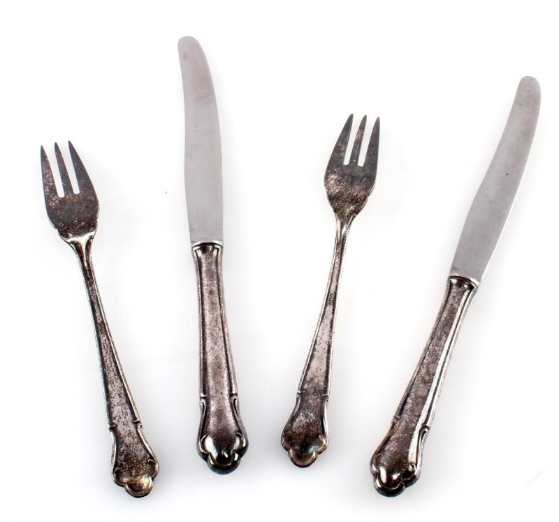 4 PIECES WWII THIRD REICH LUFTWAFFE SILVERWARE: 2 forks and 2 knives. All have raised Luftwaffe eagle and swastika on the front. The knives are marked Nicht Rostend on the front. comes in display case. It is 12" by 8" and weighs 1.3 Lbs. Shows sign