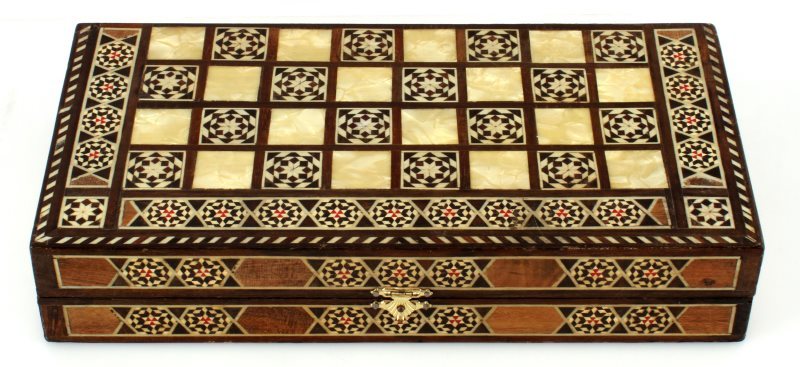 VINTAGE MIDDLE EASTERN INLAID BACKGAMMON 12": Vintage inlaid backgammon board with inlaid mother of pearl and wood. Intricate handmade design. High quality craftsmanship. 12 inches long by 2 inches thick when closed. Some wear on the edges, but o