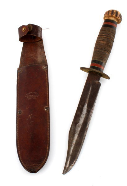 WWII ENGLAND E M DICKINSON INVICTA FIGHTING KNIFE: Good blade some loss to finish, all the leather ovals are present, stag pommel, scabbard, good and stamped Invicta.