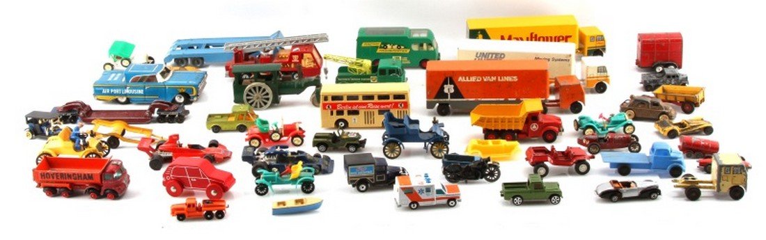 VINTAGE RALSTOY MATCHBOX LESNEY MODEL CAR LOT: Over 40 vintage model car, truck, bus, and semi pieces. Includes but not limited to: Ralstoy moving trucks, BP bus and work trucks, many Matchbox cars, some tin, some wood, one Lesney boat, and more. 