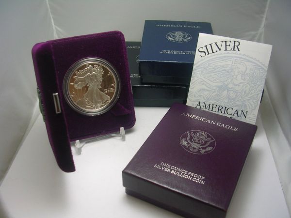 US SILVER AMERICAN EAGLE 1 OZ PROOF LOT OF 4: US SILVER AMERICAN EAGLE 1 OZ PROOF LOT OF 4 1999, 2002, 2000, 2003. ALL BOXED AS ISSUED WITH COAS.