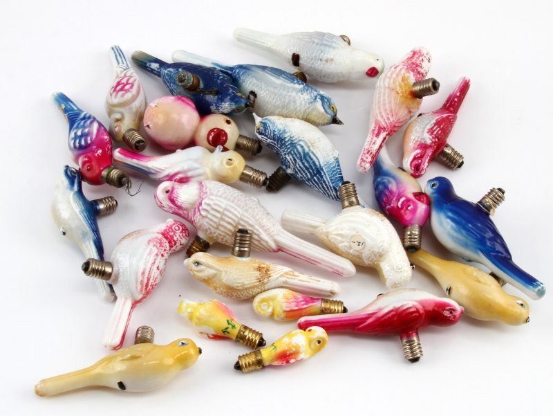 ANTIQUE MILK GLASS BIRD FIGURAL CHRISTMAS LIGHTS: A collection of 23 hand-painted milk glass bird figural Christmas lights. The birds include parrots, parakeets, bluebirds, and finches. The lights were made in Japan before WWI (pre-1946), and remain 