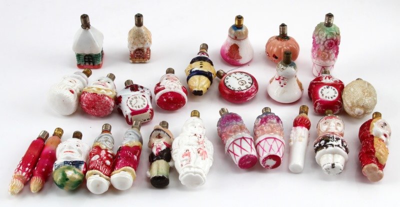 VINTAGE MILK GLASS HAND PAINTED CHRISTMAS LIGHTS: A collection of 25 early-20th century figural Christmas lights. The lights were made in Japan before the war and intended for the European market. The lights include 3 candles, 2 Christmas cottages, 2