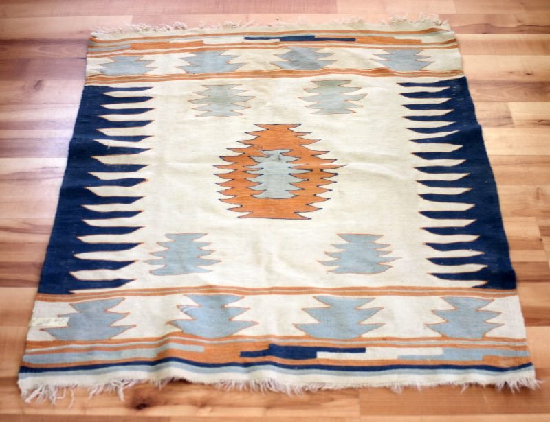 VINTAGE NAVAJO COTTON RUG 43 BY 29 INCHES: A few small holes, otherwise very good.