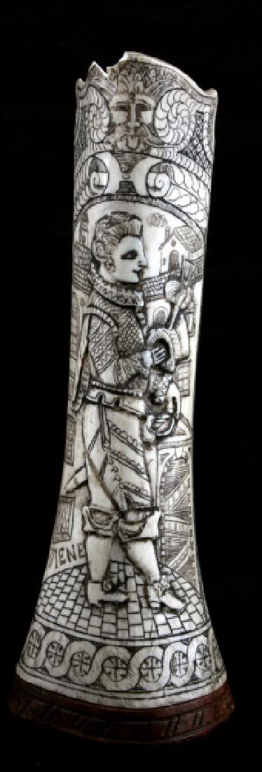 VIENNA SCRIMSHAW BONE BAROQUE SCENE: Late 19th to early 20th century complete carved bone. with a young man in the height of Baroque fashion with cityscape marked Wiene. The rest in filled with floral and geometric designs. 8 3/4" high, 