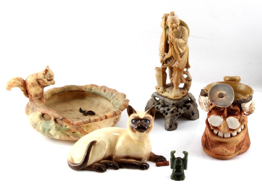 MIXED CERAMIC & STONE VESSELS AND FIGURINES: A mixed collection of vessels and figurines from the Lyndhurst Plantation, Greenville, Florida. Items include a carved soapstone statuette of an old Chinese fisherman laughing, standing with a staff a
