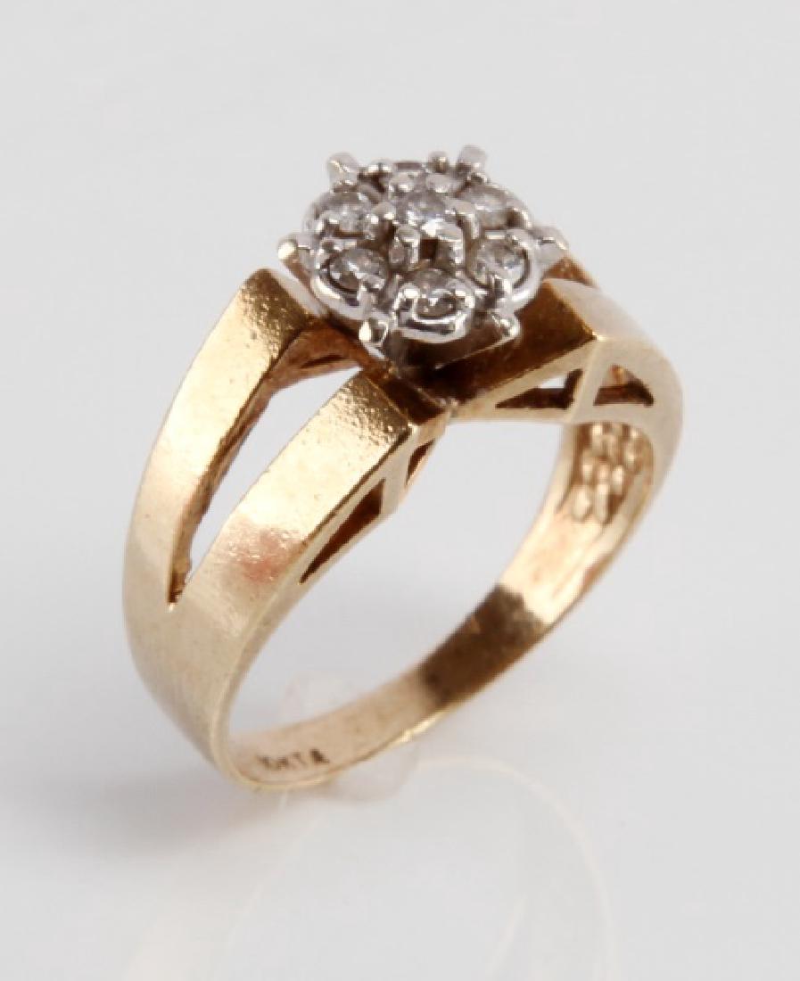 LADIES 10K GOLD AND DIAMOND RING: Features 7, 2.5 mm stones. J-M in color, eye clean. Ring measures to size 6.