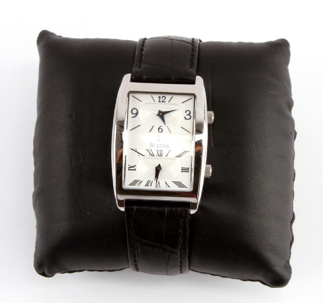 MENS STEEL BULOVA DUAL TIMEZONE WATCH MODEL 96A26: Bulova stainless steel men's dress watch features a dual-dial face. It enables you to keep track of the time in two different time zones. It has a white face background with two silver patterned inner
