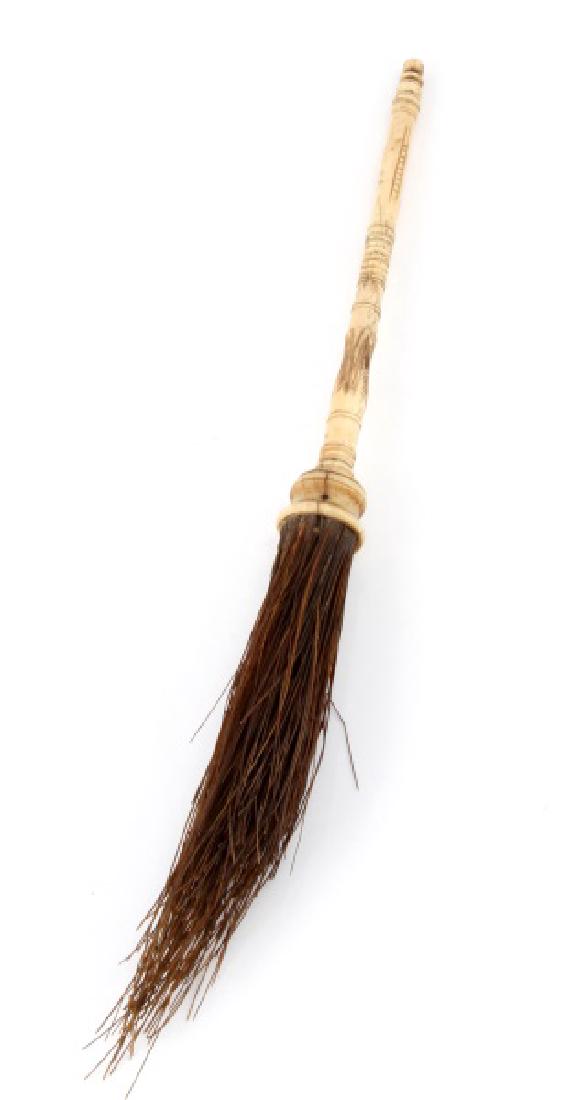 ANTIQUE BONE HANDLE WHISK BRUSH: 19TH Century carved bone brush overall length with brush 14 inches.