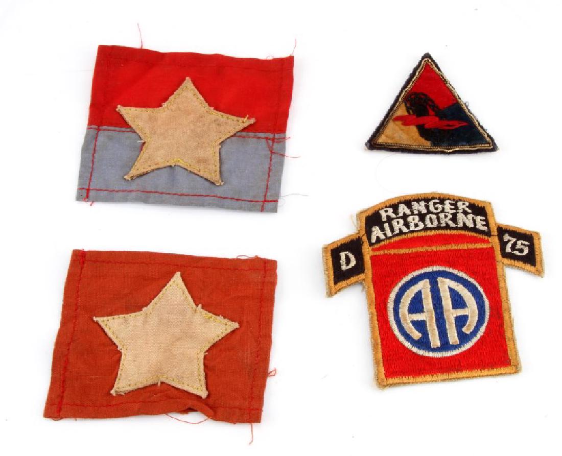 VIETNAM ARMOR RANGER & VIET CONG SHOULDER PATCHES: Includes one 2 by 2 inch armor, Airborne Rangers D75 patch and 2 3 by 3 inch North Vietnam patches. All very good.
