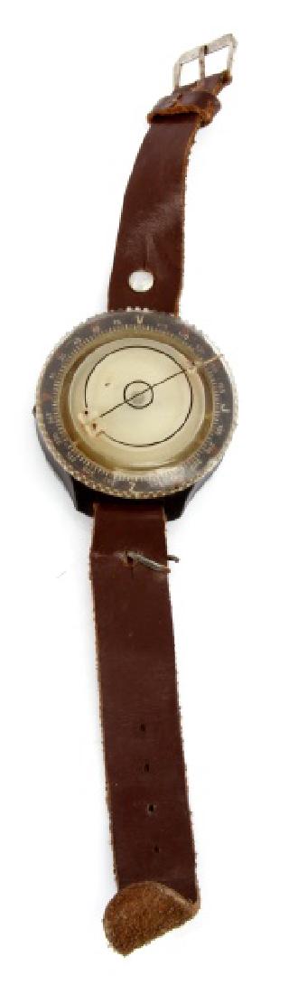 WWII GERMAN LUFTWAFFE PILOT WRIST COMPASS: Points true north a little cloudy but legible, good leather strap SBE back marked.