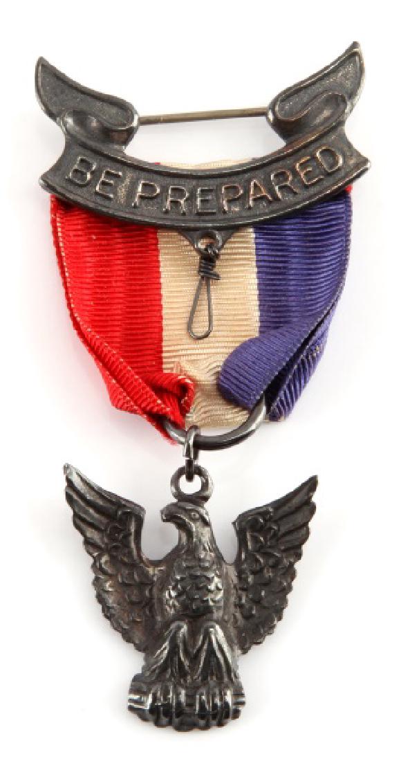 1937 ROBBINS T-3 EAGLE SCOUT STERLING MEDAL W BOX: Extremely fine example, awarded Kingdrel N. Ayers around 1937. Ayers ultimately graduated from the Coast Guard Academy and rose to the rank of Captain. Black Coffin case, in near excellent condition. 