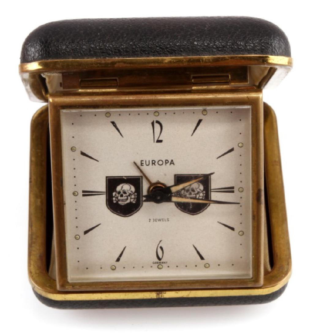 GERMAN WWII WAFFEN SS DIVISION TRAVEL CLOCK: Some discoloring and wear present to clock; overall in very good condition. Unauthenticated as is. This lot has a reserve.