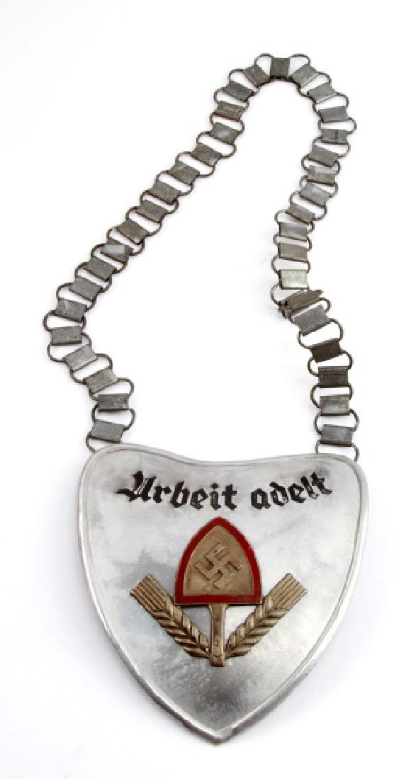 GERMAN WWII THIRD REICH RAD GORGET WITH CHAIN: Light wear present to gorget; overall in very good condition. Unauthenticated as is. This lot has a reserve.