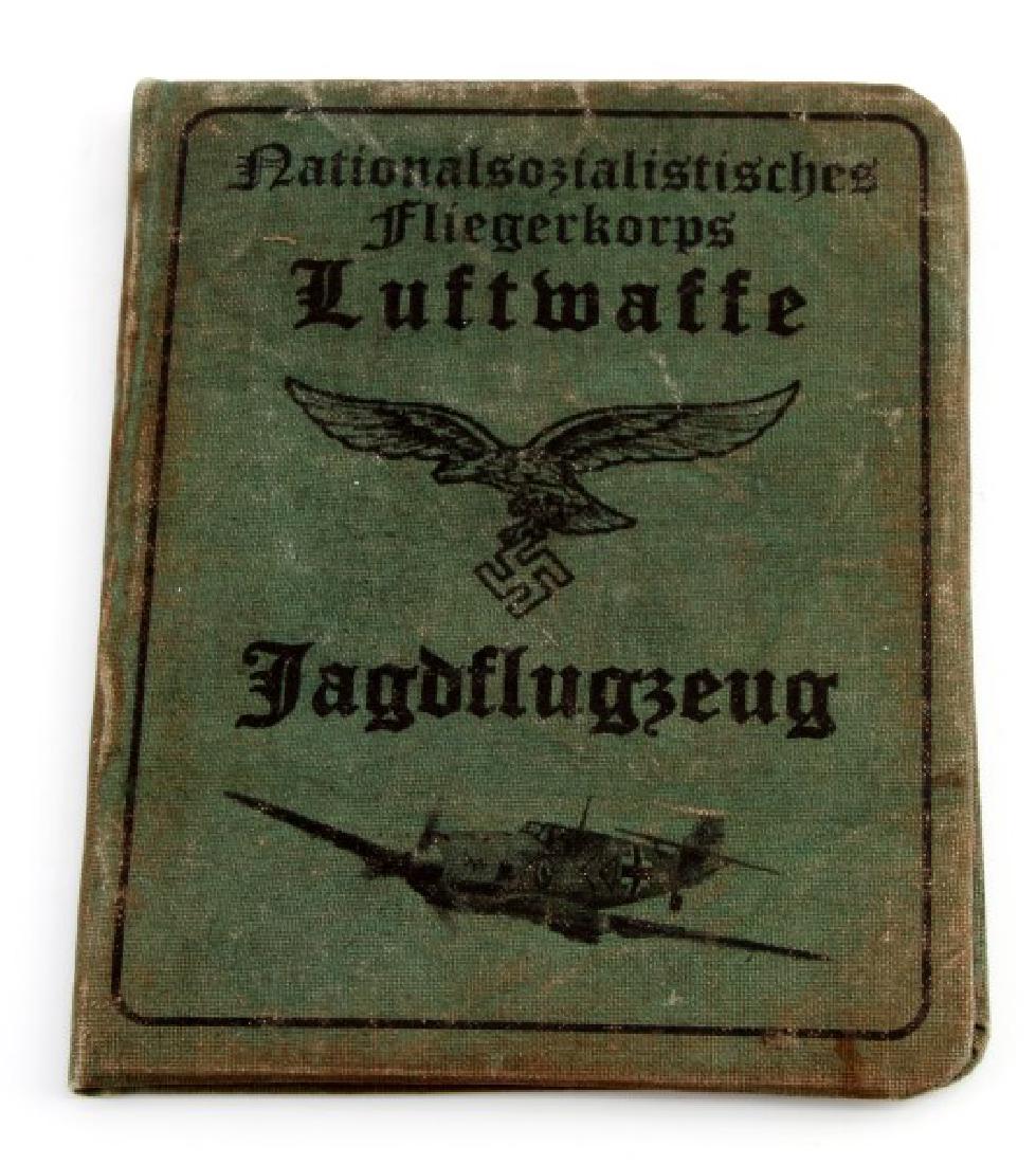 GERMAN WWII LUFTWAFFE JAGDFLUGZEUG ID SOLDBUCH: Measures 3 15/16" wide by 5" tall. It measures 7 15/16" wide open. The inside has a photo of the pilot wearing his officers visor cap. You can also see his oak leaf around his neck. It lists his name 