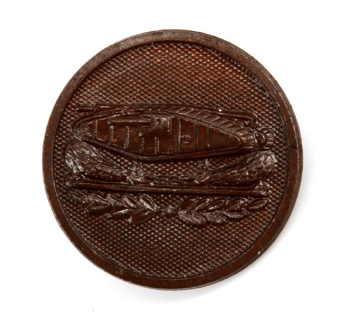 US WWI ARMY TANK ARMORED ENLISTED COLLAR DISC: Measures 1" in diameter. Reverse side is marked "NS Meyer inc New York. Has a screw mount post and nut ion the reverse.