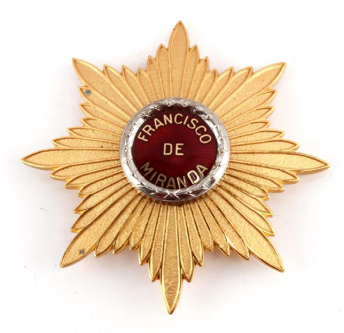 ORDER OF FRANCISCO DE MIRANDA GRAND CROSS STAR: Venezuela Order of Francisco de Miranda grand cross breast star. Measures 3-1/8" wide by 3-1/8" tall. The reverse is marked 'NS Meyer New York Army Navy Equipment'. Has a thin vertical pin back with a